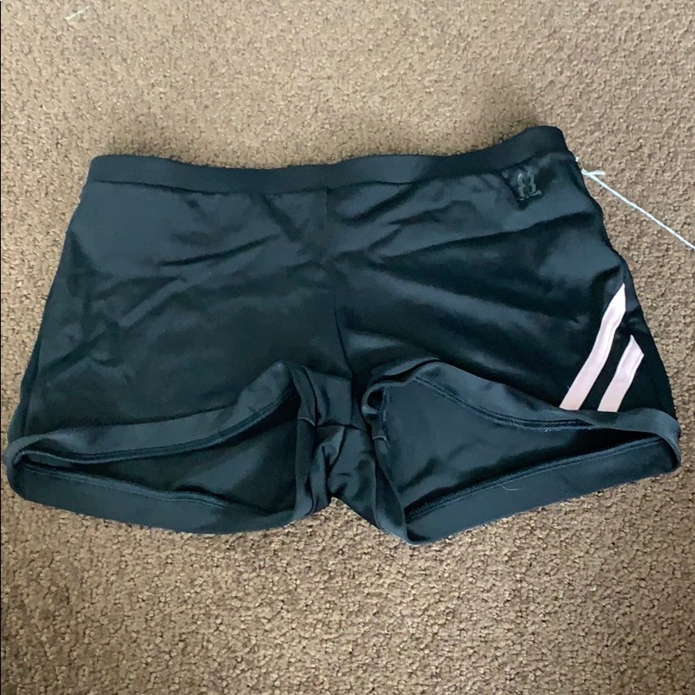 Black dance shorts with pink stripes